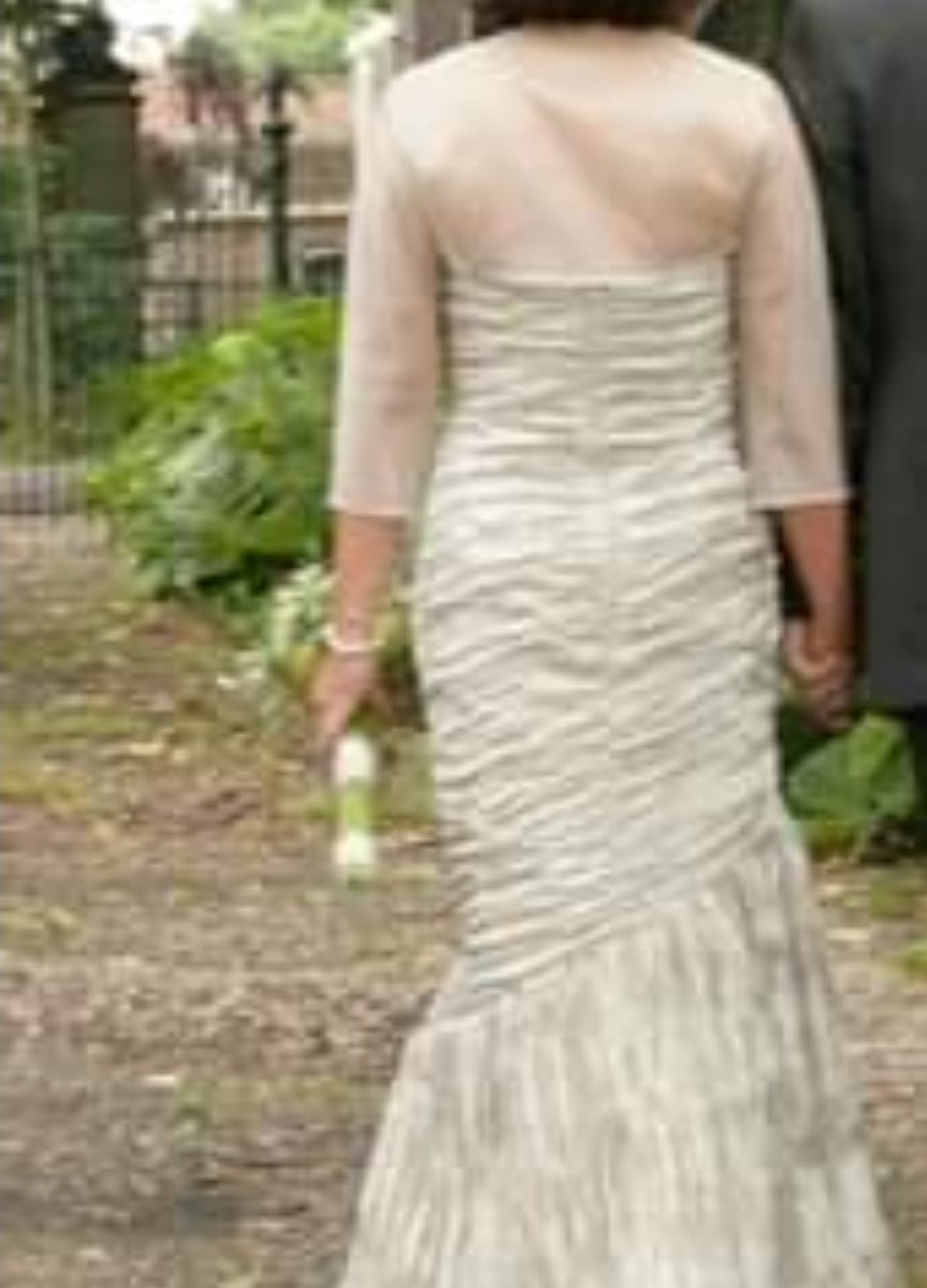 Trouw-of galajurk platina beige, Pronovias,met of zonder mouwtjes.