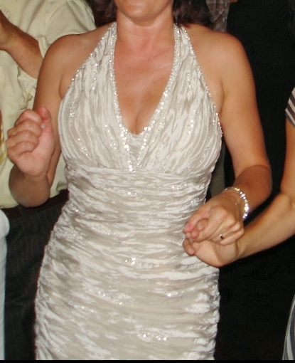 Trouw-of galajurk platina beige, Pronovias,met of zonder mouwtjes.