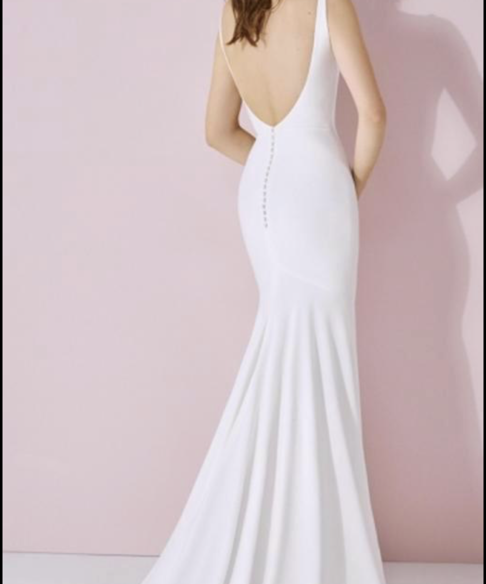 Een gave trouwjurk, White One by St. Patrick