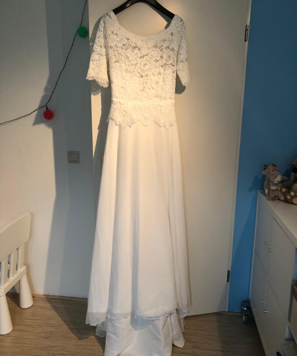 Bianco Evento jurk niet gedragen!