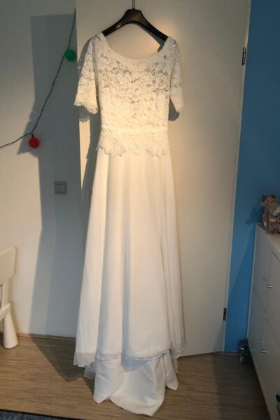 Bianco Evento jurk niet gedragen!