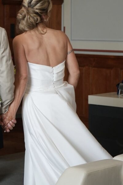 Strapless jurk met strik en of overrok